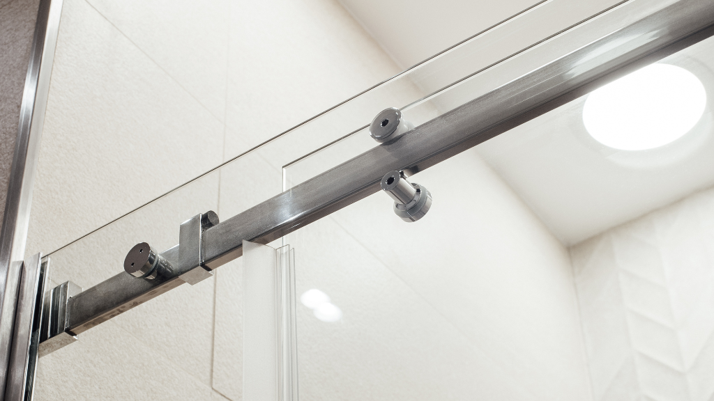 zoom sur une roulette de porte de douche