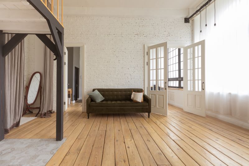 Pose d'un parquet en bois perpendiculaire à la umière